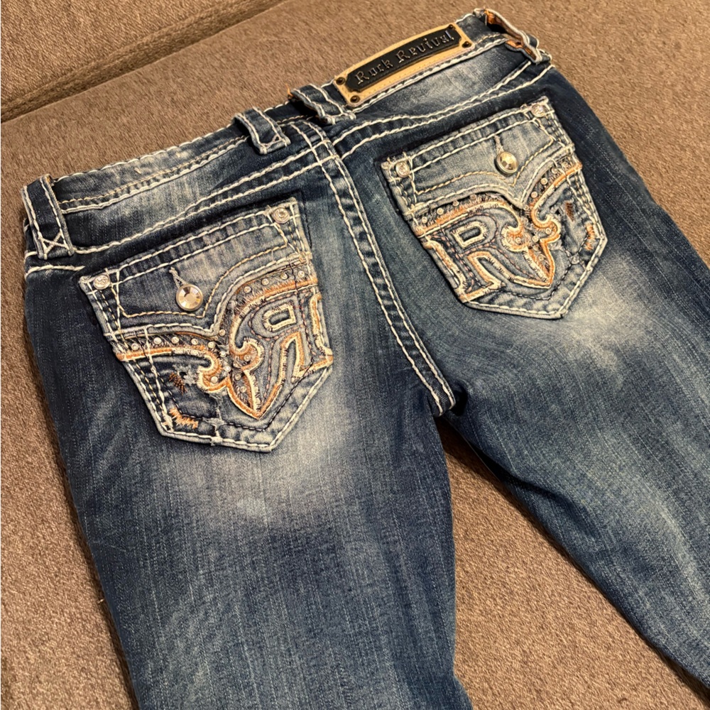 Rock Revival Blue Boot Cut Jeans with Embellished Pockets